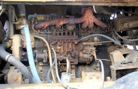 Close-up of the engine of a loader - pipes, wires and tubes.   Half Page size 2550 x 1650px (300ppi).  Actual image size 8.5 x 5.5".